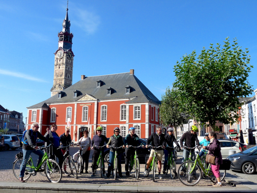 Energetic Lions Heraldic Bikers investigate the fruit fields of Sint Truiden